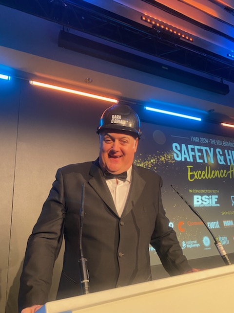 Dara O'Briain, with a personalized Nexus E:Protect helmet at the Health & safety Event, NEC Birmingham.